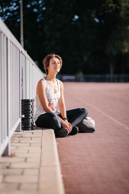 girl sitting in the stadium