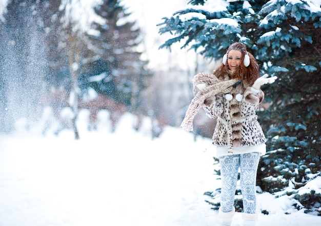 Girl in snowy forest