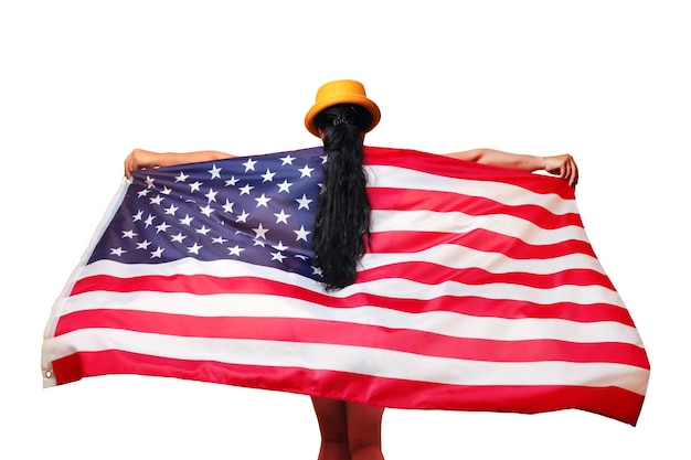 Girl stands with her back and holds the American flag girl in fashionable hat with USA flag