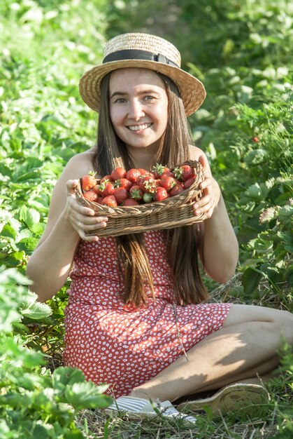 Girl in strawberry field