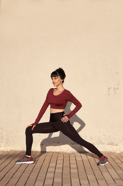 Girl stretching outdoors