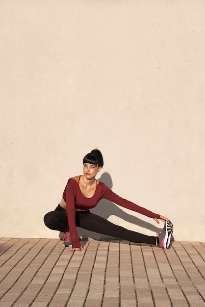 Girl stretching in the park