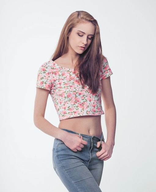 Photo girl student in jeans and summer blouse
