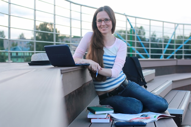 Girl student study homework outdoor