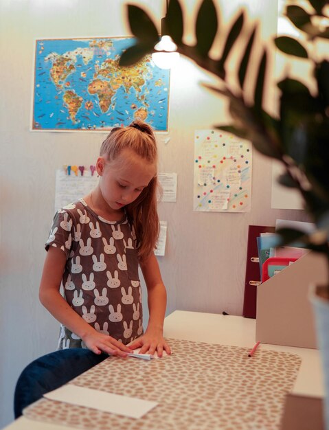 girl studying at the table