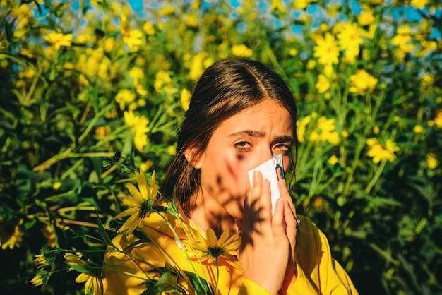 The girl suffers from pollen allergy during flowering and uses napkins beautiful sexy young woman li