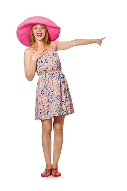 Девушка в летнем легком платье и шляпа на белом
