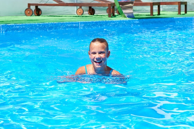 Girl swimming in pool