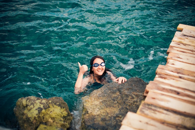 girl swims in the sea