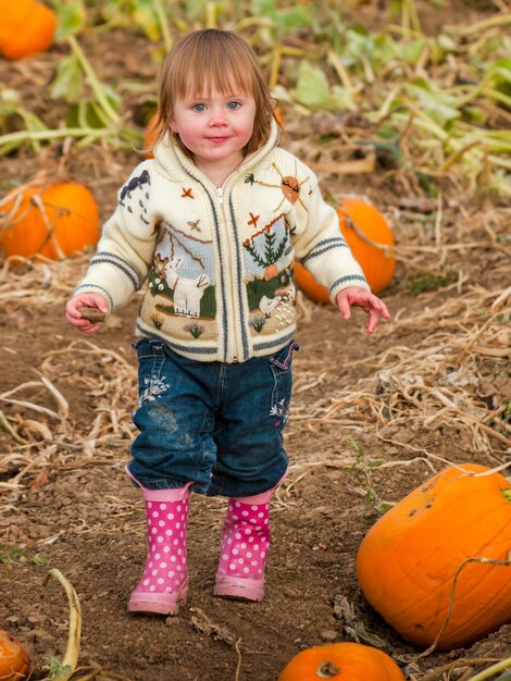 Girl toddler on the farm.