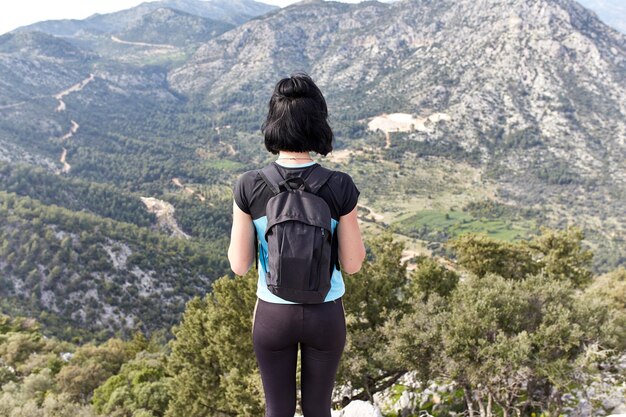 Girl on the top of mountain