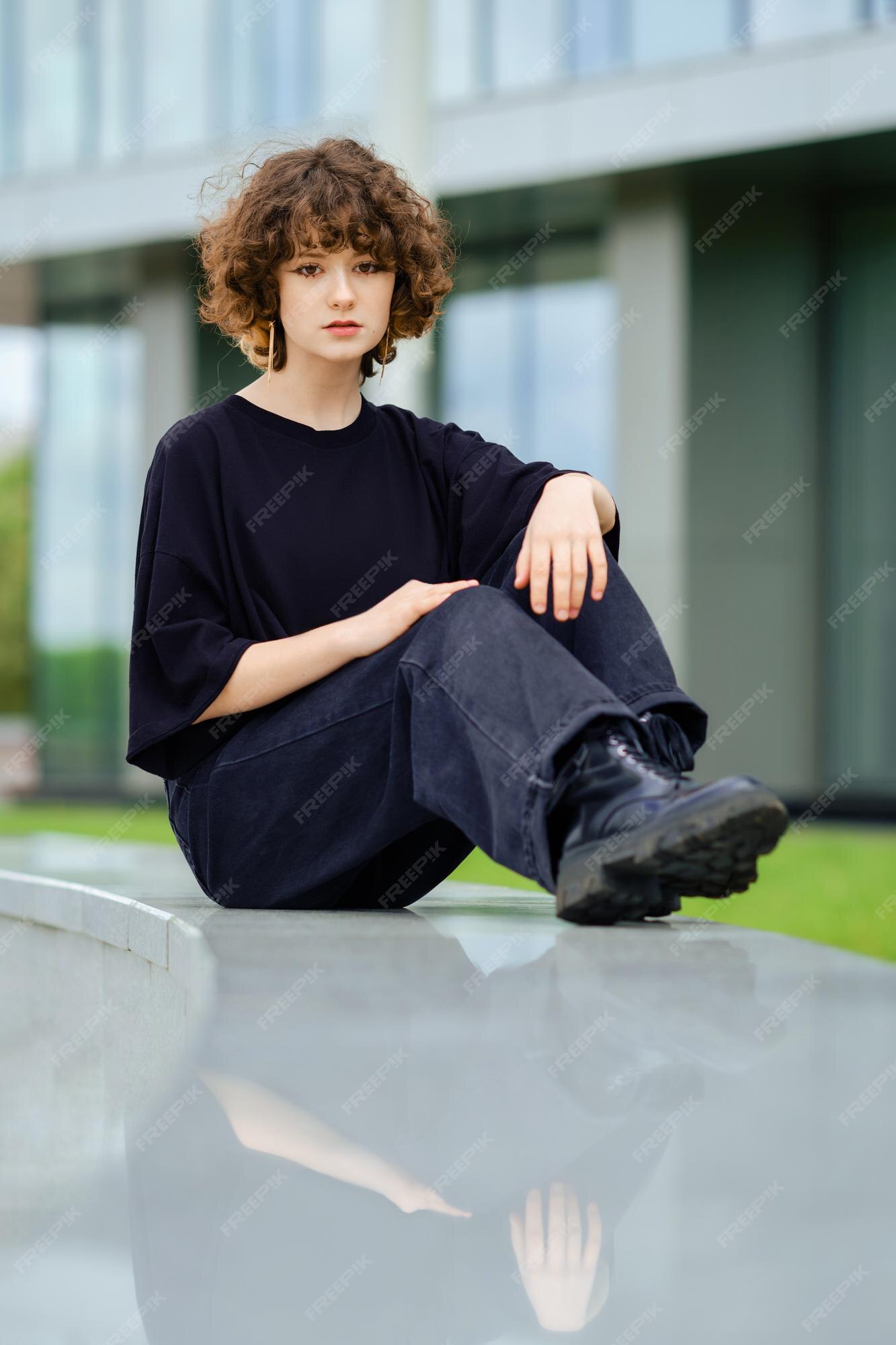 Premium Photo | Girl in total black outfit outdoors