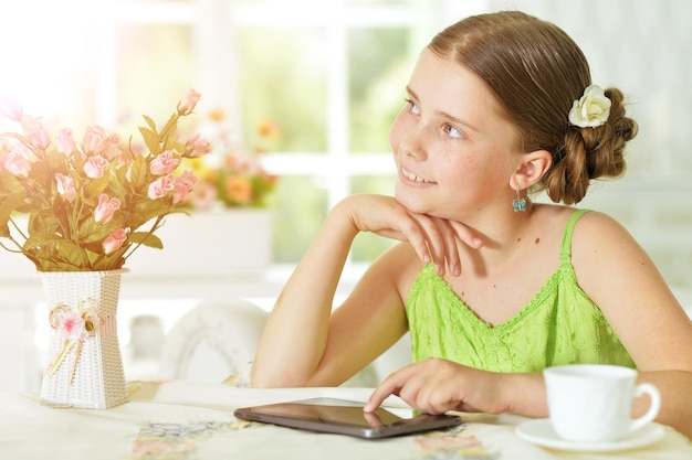 Girl using digital tablet