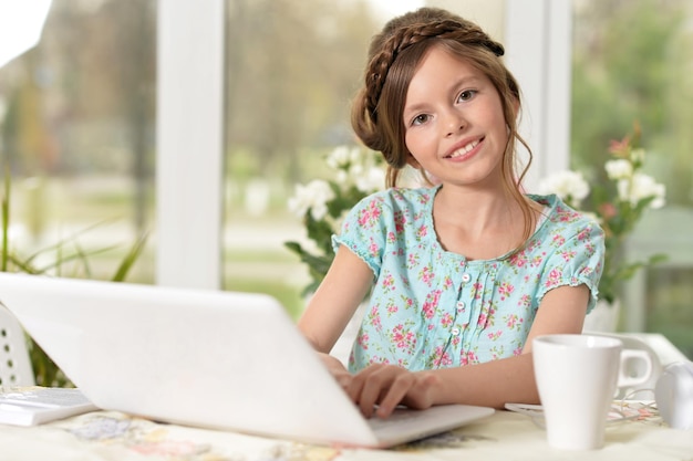 Girl using modern laptop