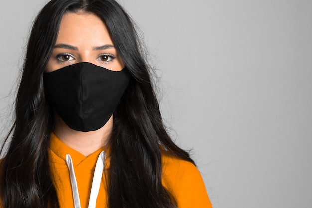 Girl using protective mask