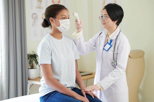 Girl visiting the doctor at hospital