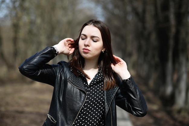 Girl on a walk through the spring city