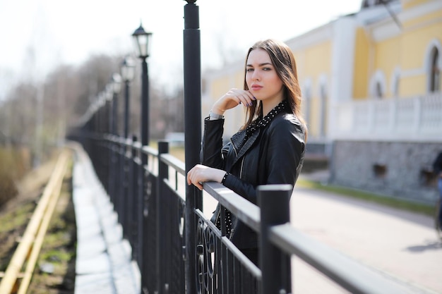 Girl on a walk through the spring city