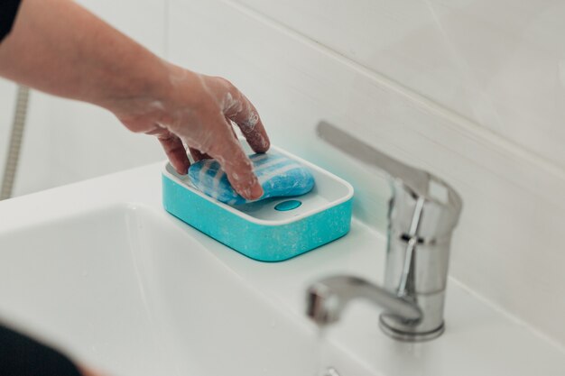 The Girl Washes Her Hands to Avoid Infection With the Virus COVID-19.