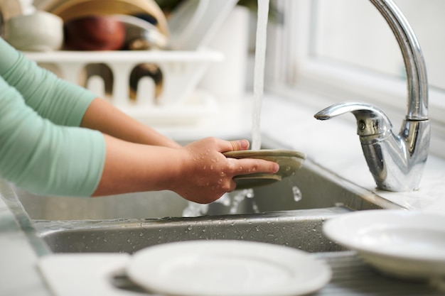 Girl Washing Dishes