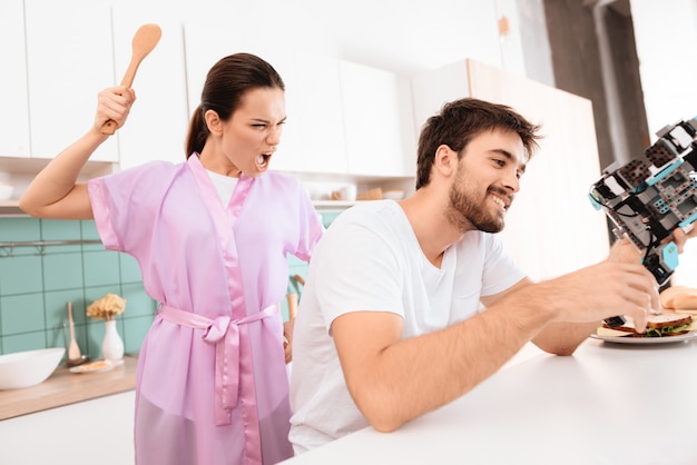 Girl Watch Indignantly. Man Ignores Girlfriend.