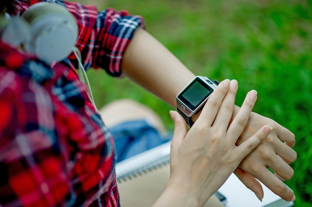 The girl watches the watch