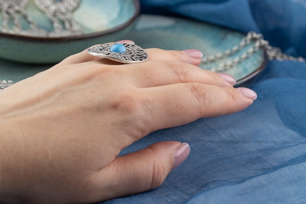 Girl wearing many antique handcrafted Turkish jewelry