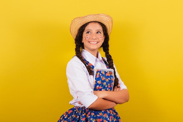 Girl wearing typical clothes for Festa Junina Arms crossed smiling and happy For the Festival do Arraia