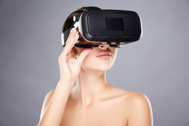 Girl wearing virtual reality glasses