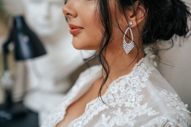 Girl in a wedding dress close-up