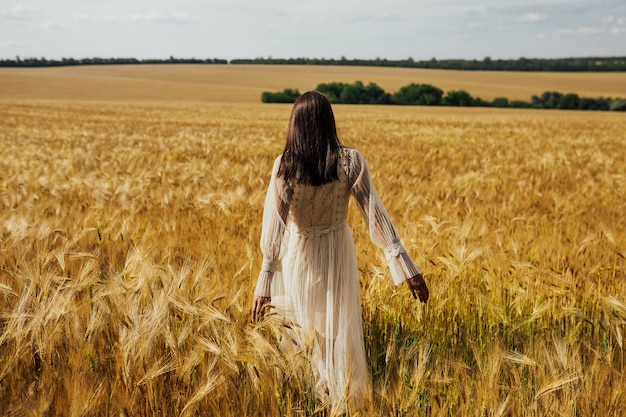 Girl in wheat field