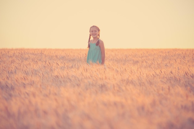 Girl on a wheat field