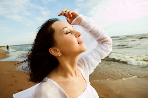 Girl on white at the beach