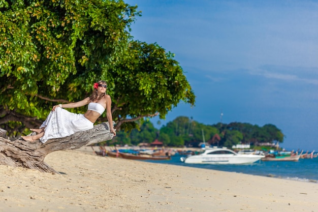 Girl in white on the beach