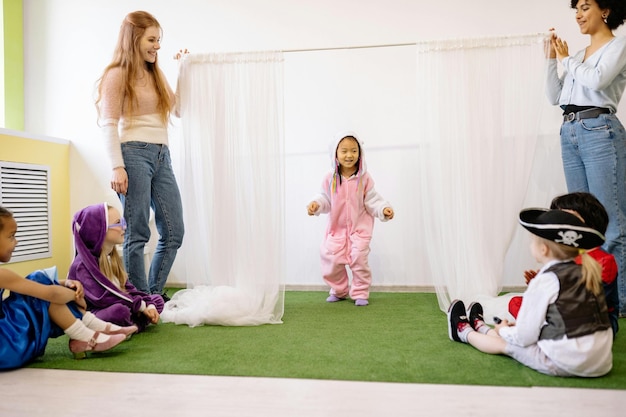 Girl In White and Pink Overall With Hoodie Stock Photo