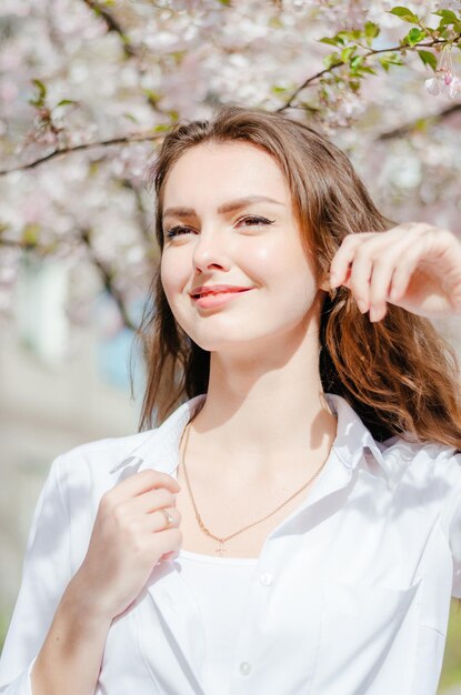 Girl in a white shirt with sakura