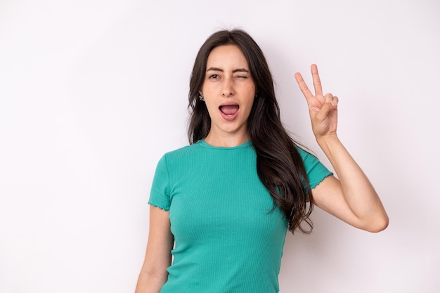 Girl winking and showing the peace sign