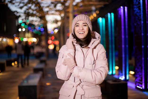 Girl in winter clothes laughing cute