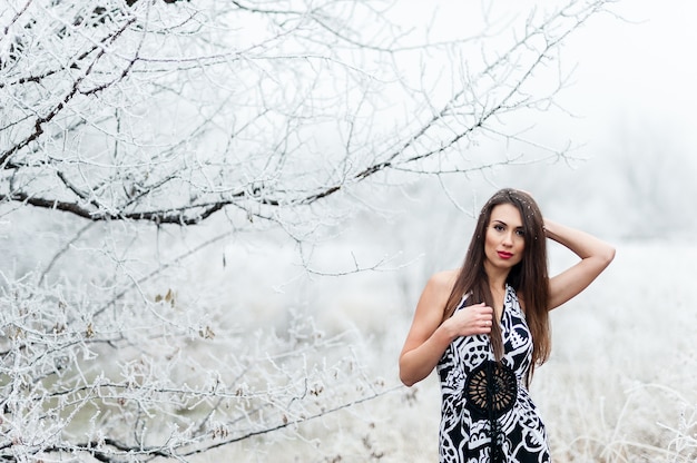 Girl in the winter forest