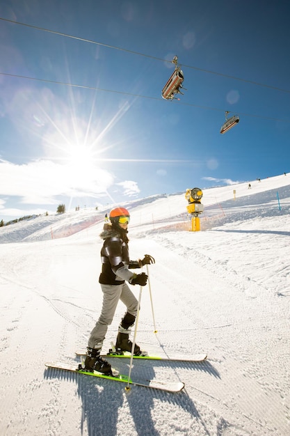 Girl at winter skiing bliss a sunny day adventure