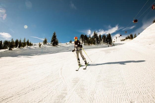 Girl at winter skiing bliss a sunny day adventure