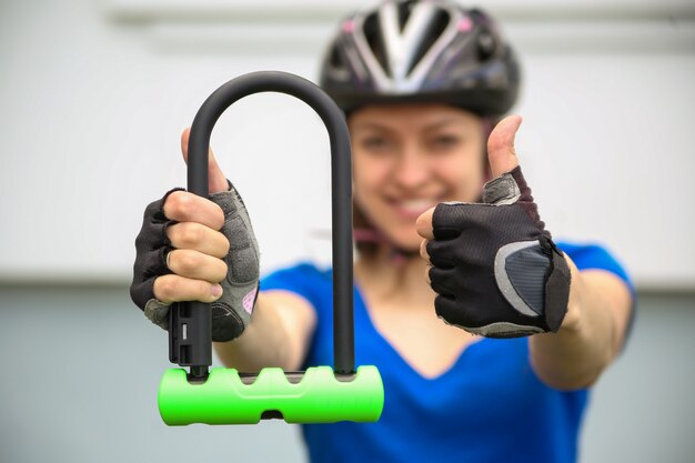 Girl with bicycle lock