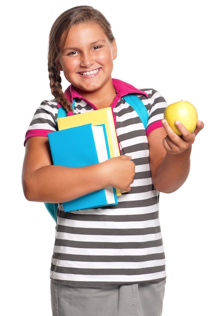 Фото Девушка с книгами и яблоком на белом фоне