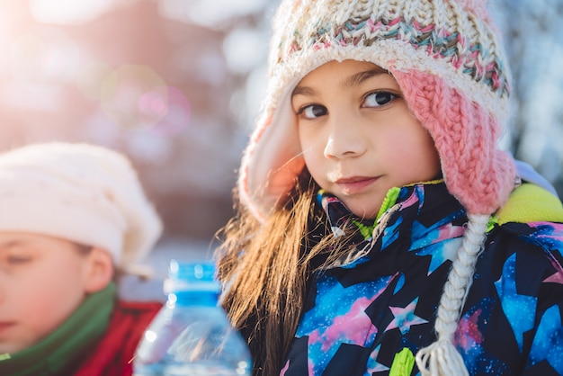 Girl with bottle of water