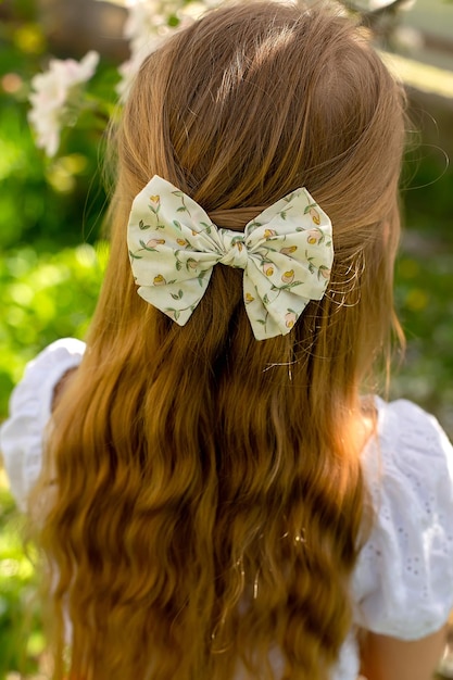 A girl with a bow in her hair