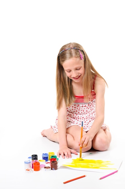 Girl with brush on white background