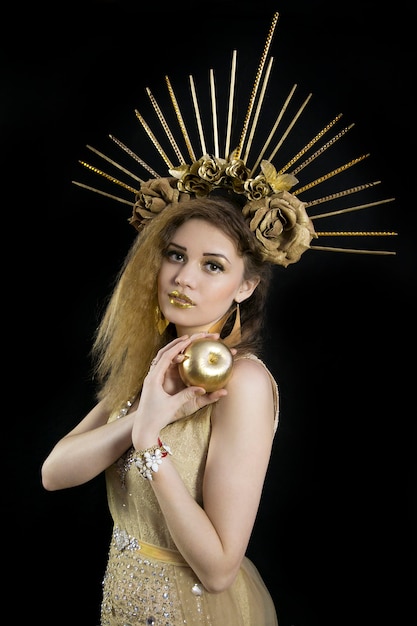 Girl with a Crown on his head and Golden Apple