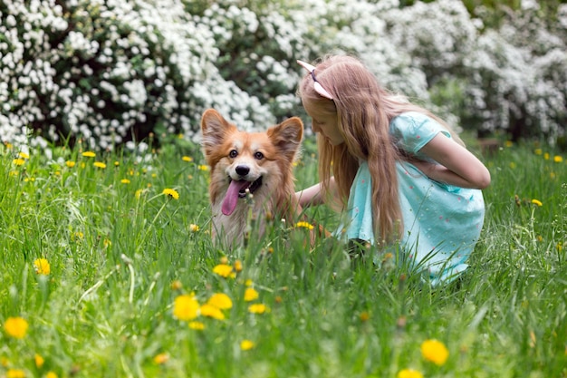 Girl with dog outdoors