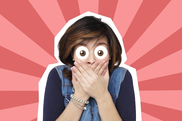 Photo girl with drawn surprised eyes closes hands over her mouth in shock by what she heard