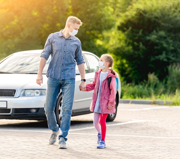 Girl with father going back to school